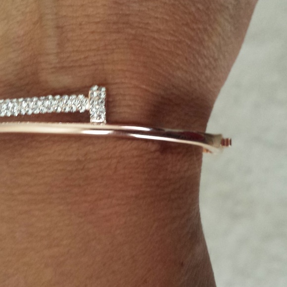 Rachels Accessories Jewelry - Stainless Steel Rose gold Nail bracelet.